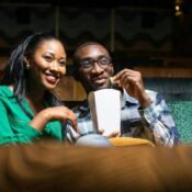 Tolulope and Chidinma Olajide watching a movie in a cinema